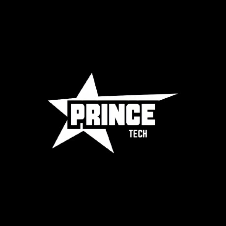 Prince working on a laptop